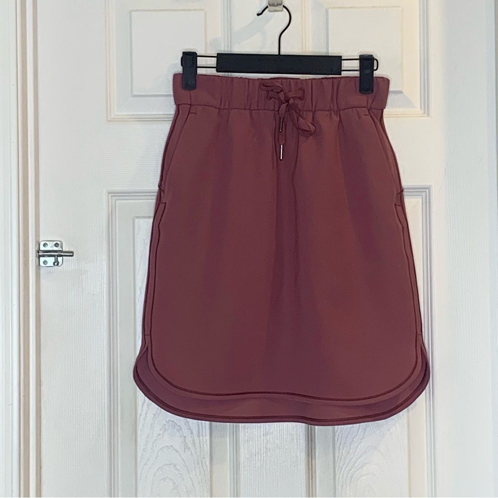 Lululemon on the fly skirt, color: cherry cola, size 4